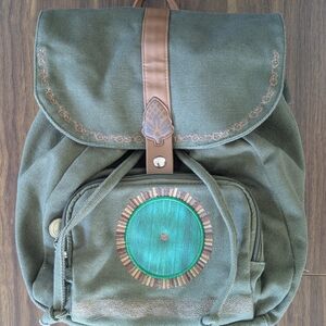 Green Canvas Backpack with Brown Accents
